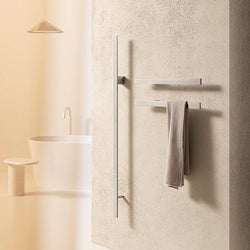 Collection of bathroom towel racks in a gallery layout